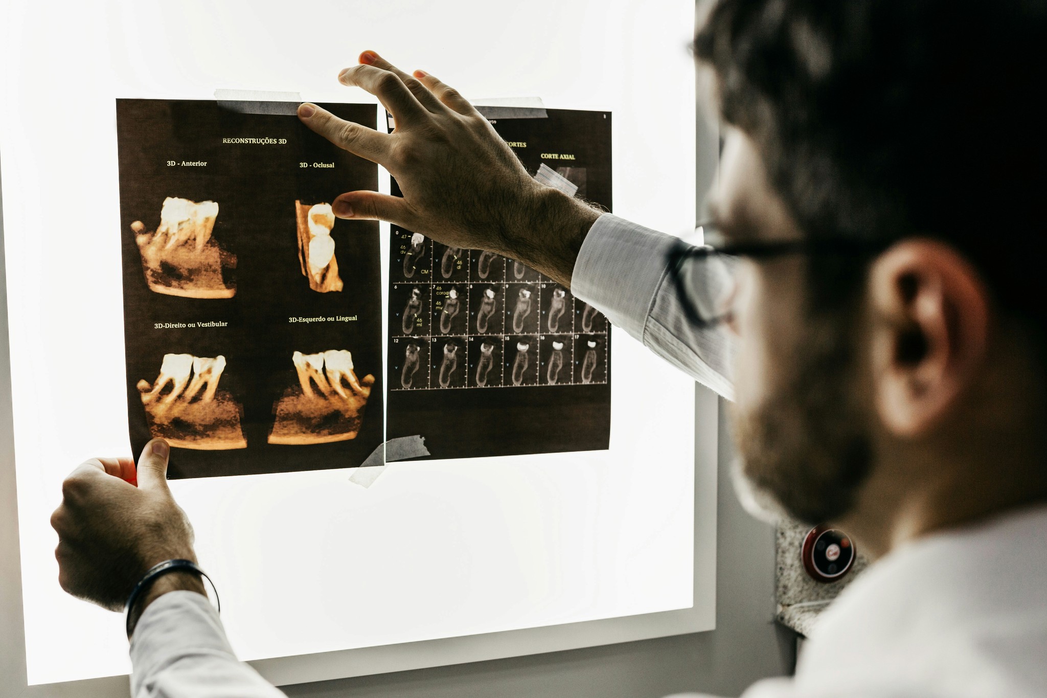 Dentist reviewing a dental scan